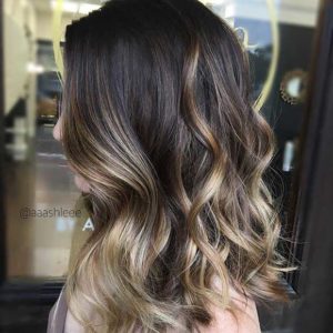 Light and shine for your dark hair with blonde highlights!