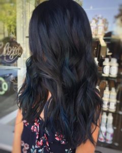 Dark brown hair with blue highlights