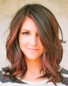 Dark brown hair with red highlights