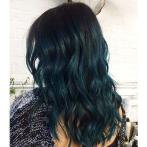 Black hair can, if possible, look even better with teal highlights