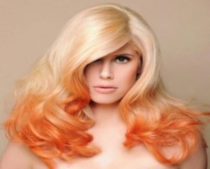 Blonde hair with orange highlights