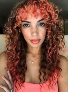 Curly fantasy colored hair with Bangs and highlights