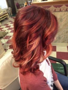 For red hair, try some subtle dimensional highlights