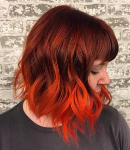 It would surprise you how orange highlights can enhance your beauty